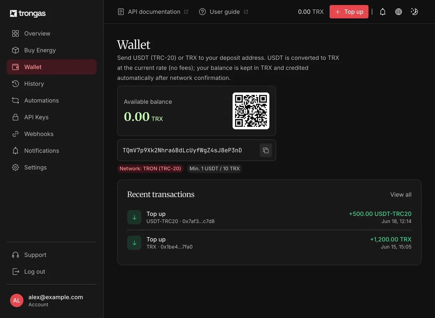 The Wallet page: available balance with the deposit address and its QR code, and recent transactions showing a credited USDT deposit and a credited TRX deposit.